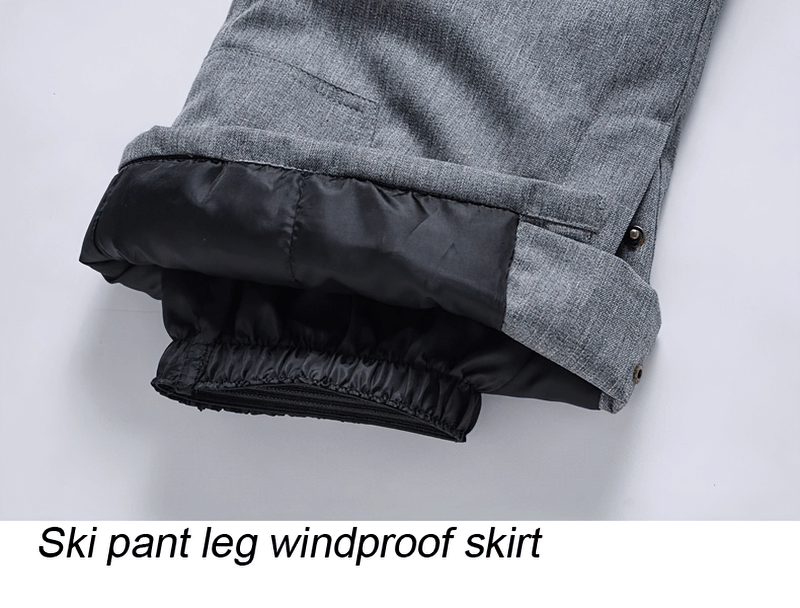 Close-up of ski pant leg with windproof skirt, showcasing premium fabric and insulation for ultimate warmth and protection.